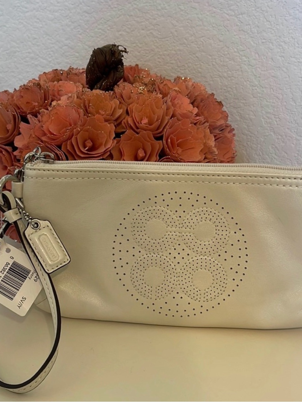 NWT Coach Cream Leather Wristlet Clutch with Perforated Circle Detail